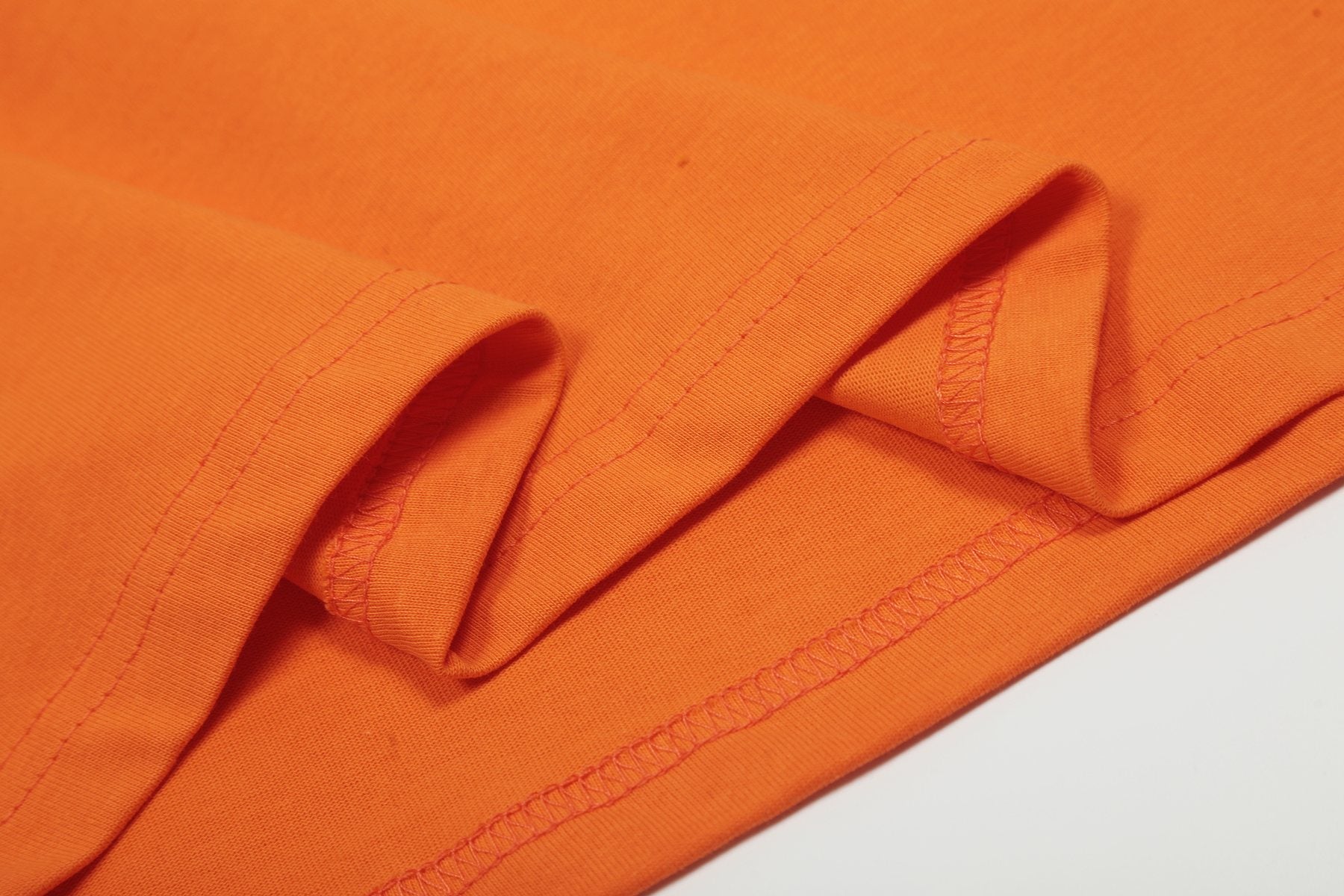 Sp5der Orange Star Graphic T-Shirt — detail