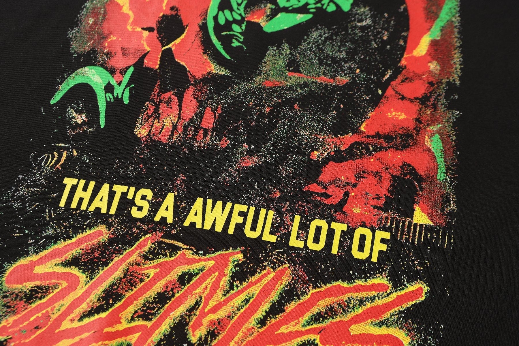THAT'S A AWFUL LOT OF COUGH SYRUP Astronaut Slime Graphic T-Shirt — detail