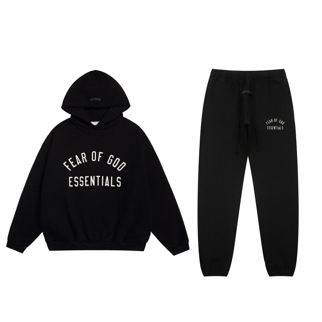 Fear of God Essentials Arched Graphic Hoodie in Black — context