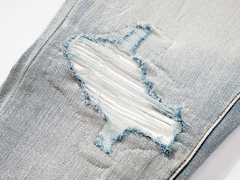 AMIRI Light Blue Distressed Ripped Knee Jeans — detail