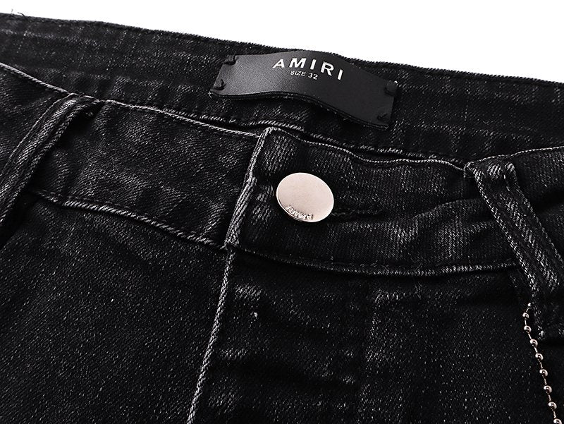 Amiri Varsity Letter Patch Distressed Jeans — detail