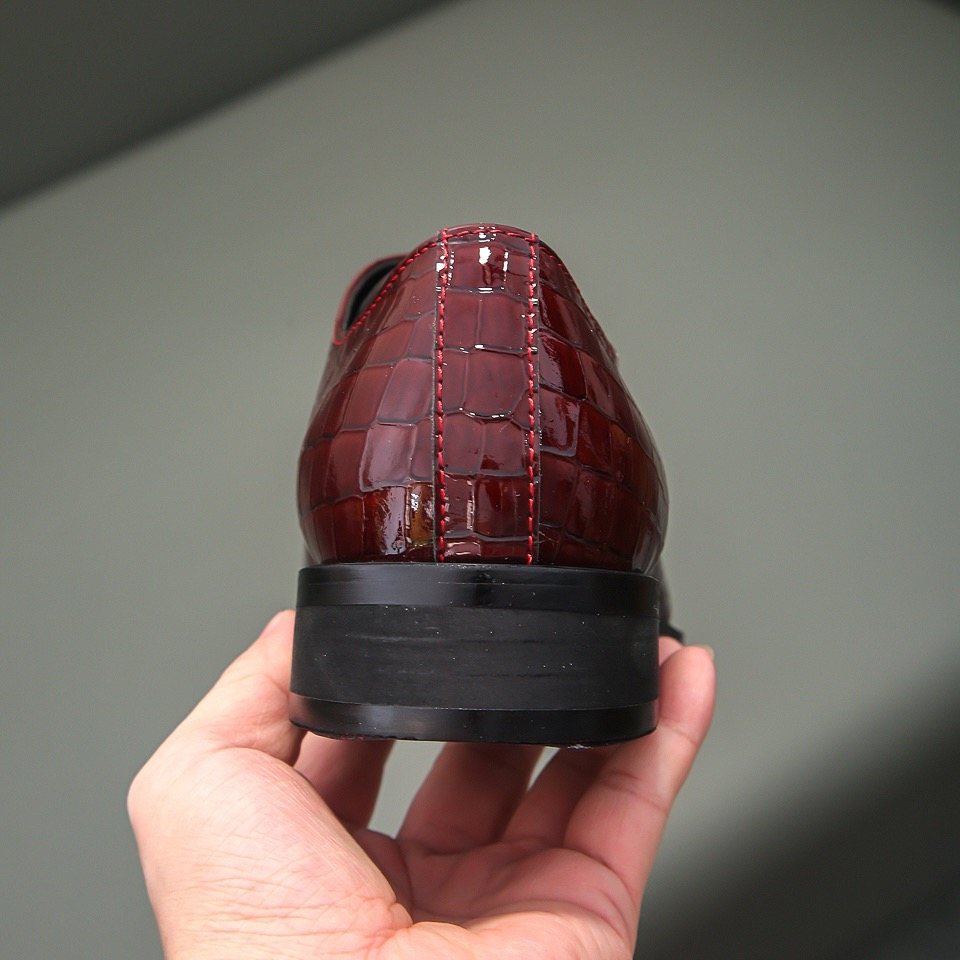 Hermès Burgundy Crocodile-Pattern Loafers — detail