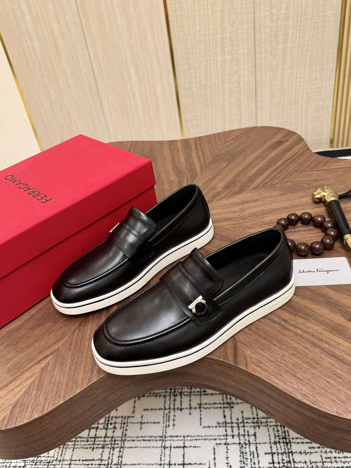 Salvatore Ferragamo Black Loafers with White Soles — front