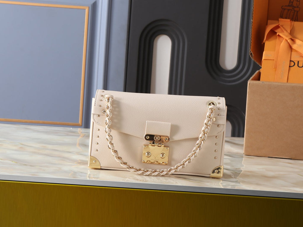 Louis Vuitton Trunkie East West Cream Shoulder Bag — hero