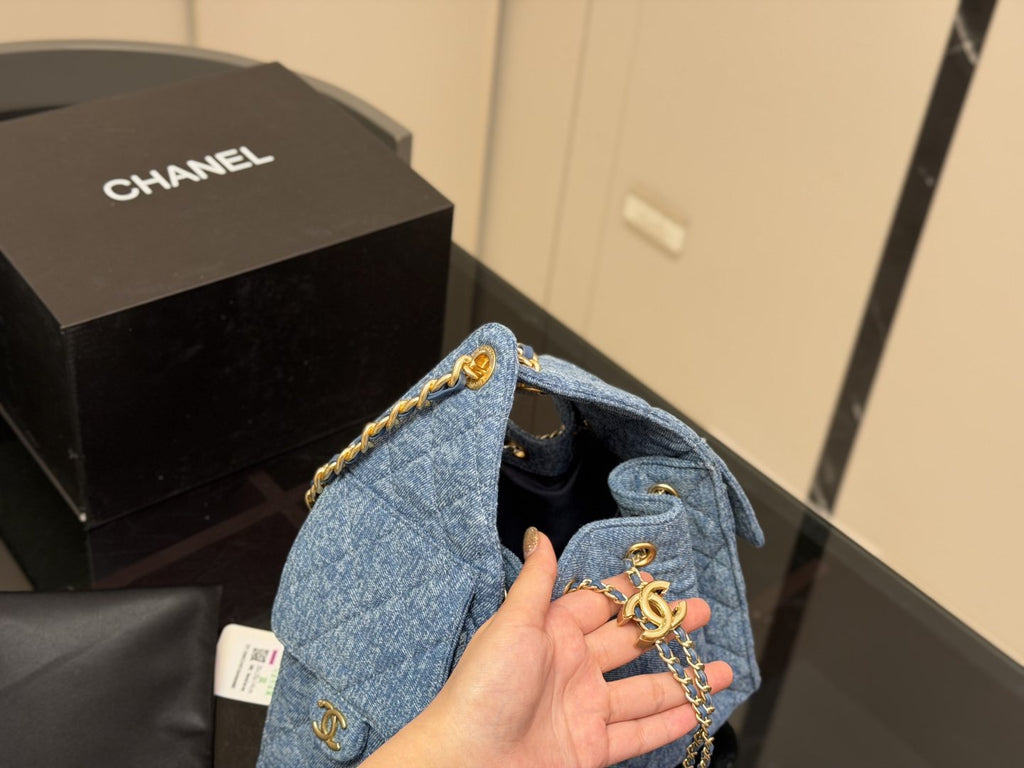 Chanel 25 Blue Quilted Hobo Bag — front