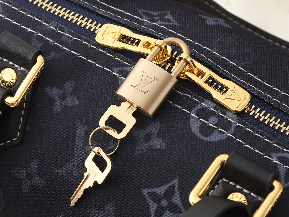 Louis Vuitton Speedy Soft Monogram Emblème Handbag — detail