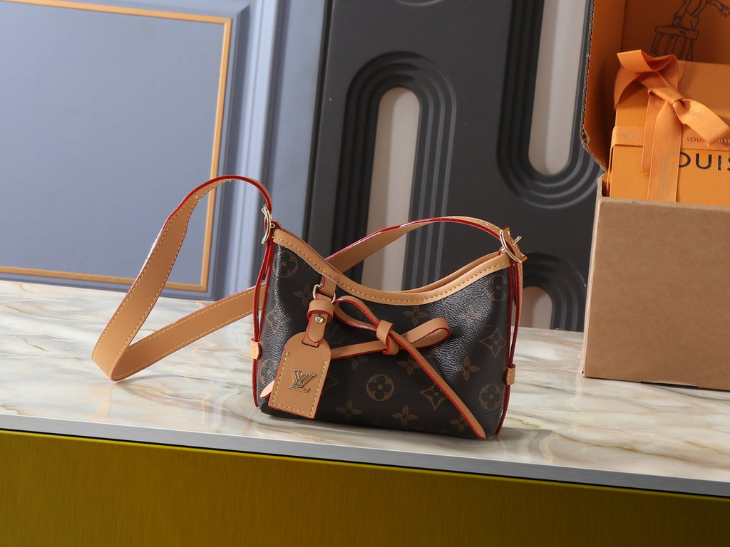 Louis Vuitton Nano CarryAll Monogram Handbag — hero