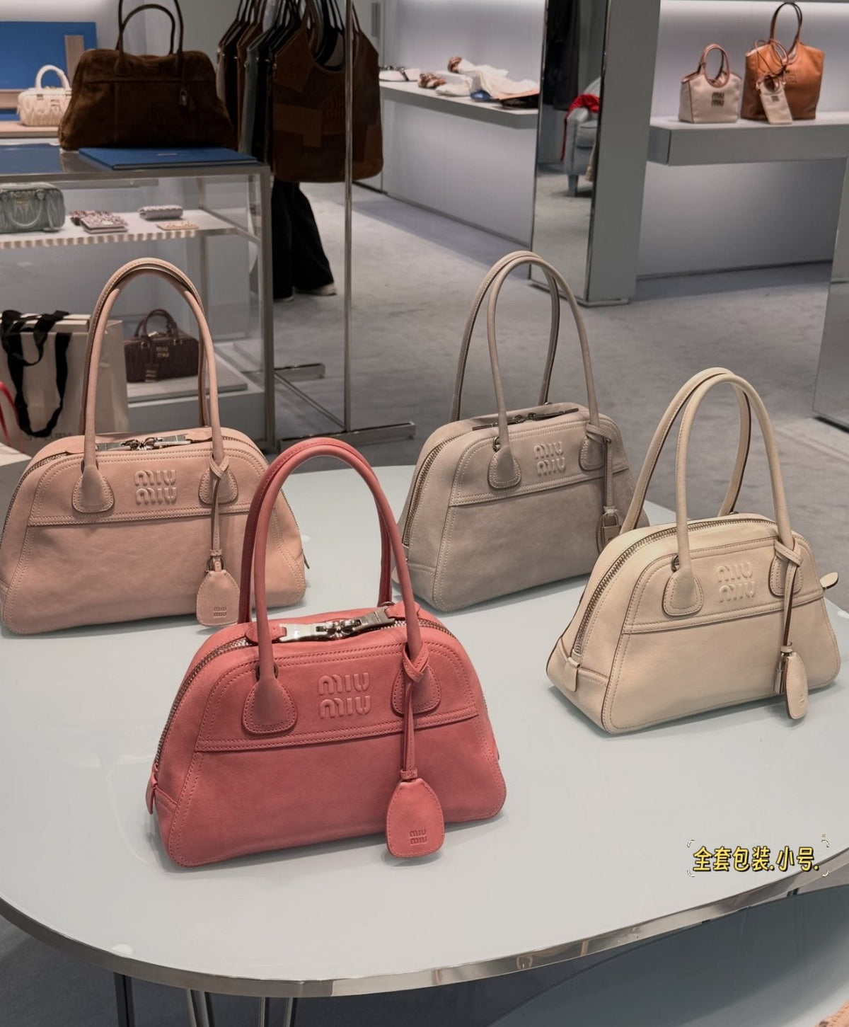 Miu Miu Vivant Zip-Top Bowling Bag — comparison