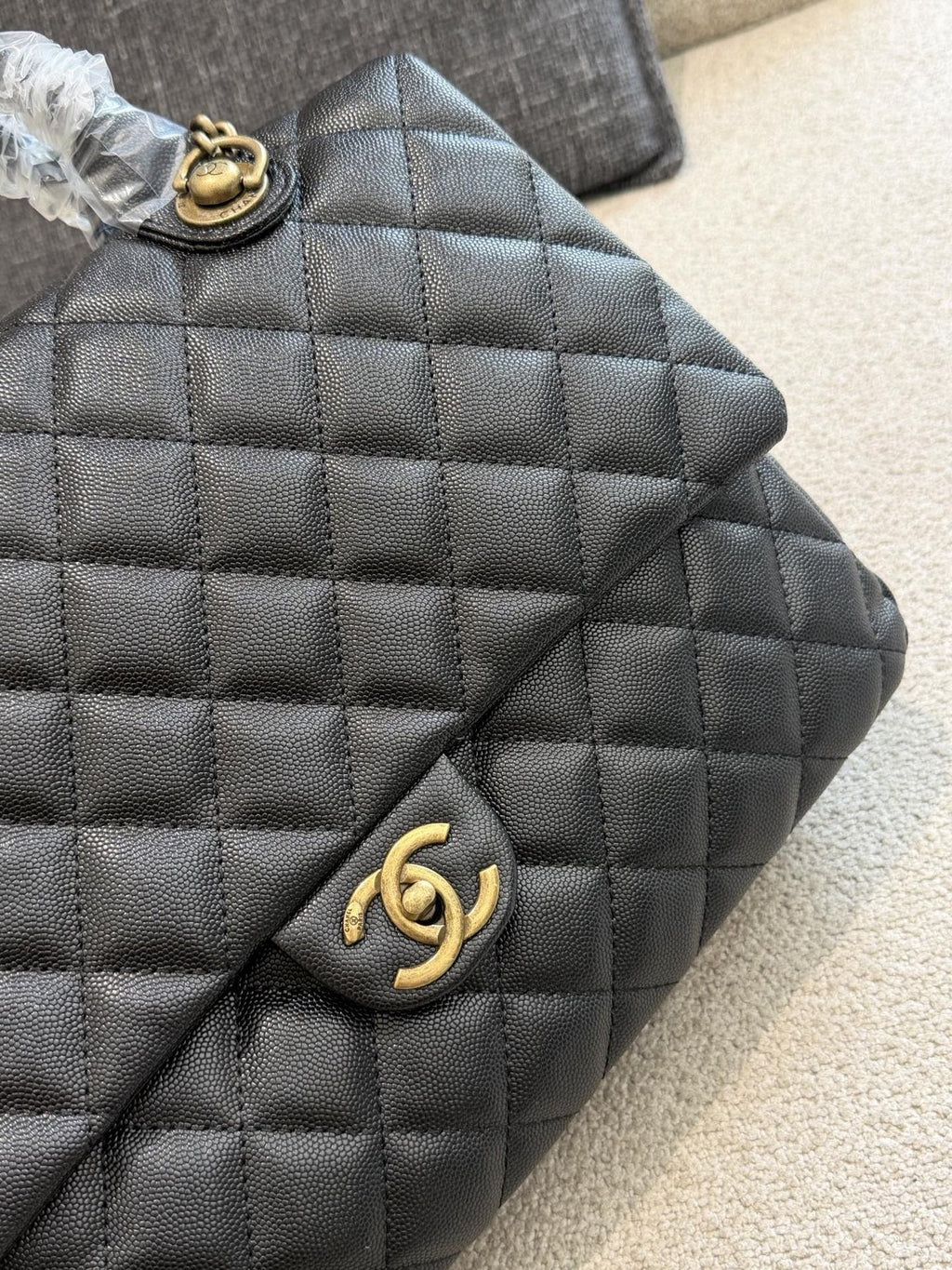 Chanel Diamond-Quilted Top-Handle Flap Bag — detail