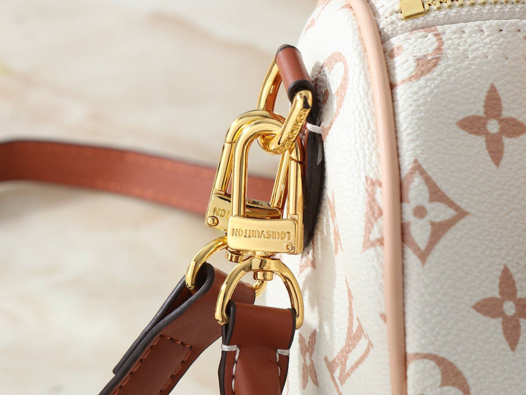 Louis Vuitton Crafty Speedy Bandoulière Monogram Bag — detail