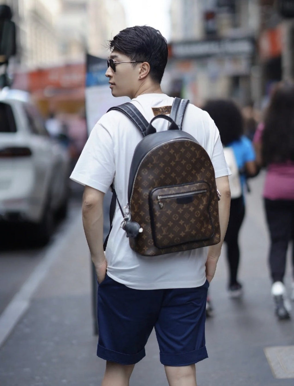 Louis Vuitton Black-Trim Zip Backpack — model