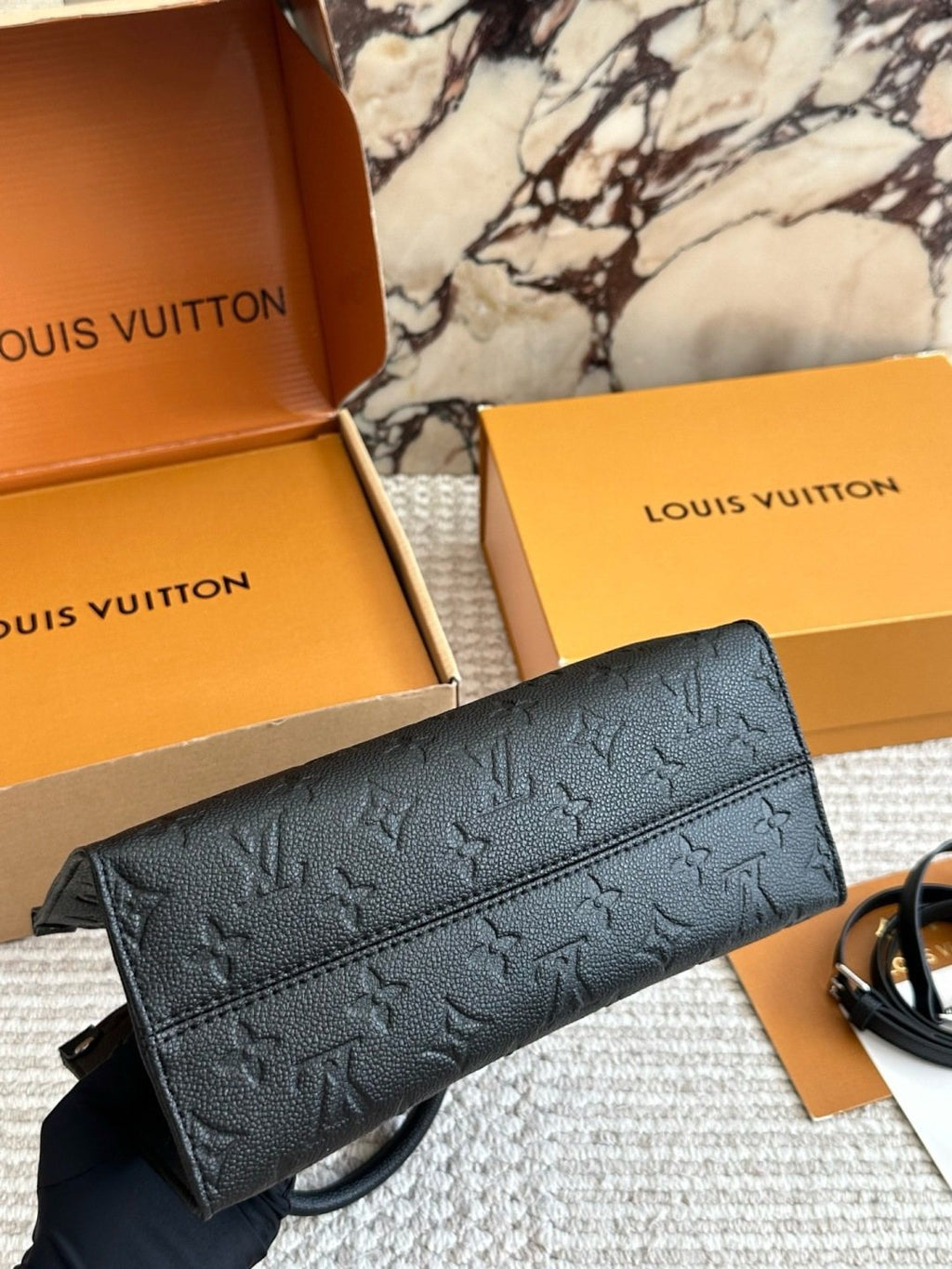Louis Vuitton Onthego Black Embossed Tote — detail