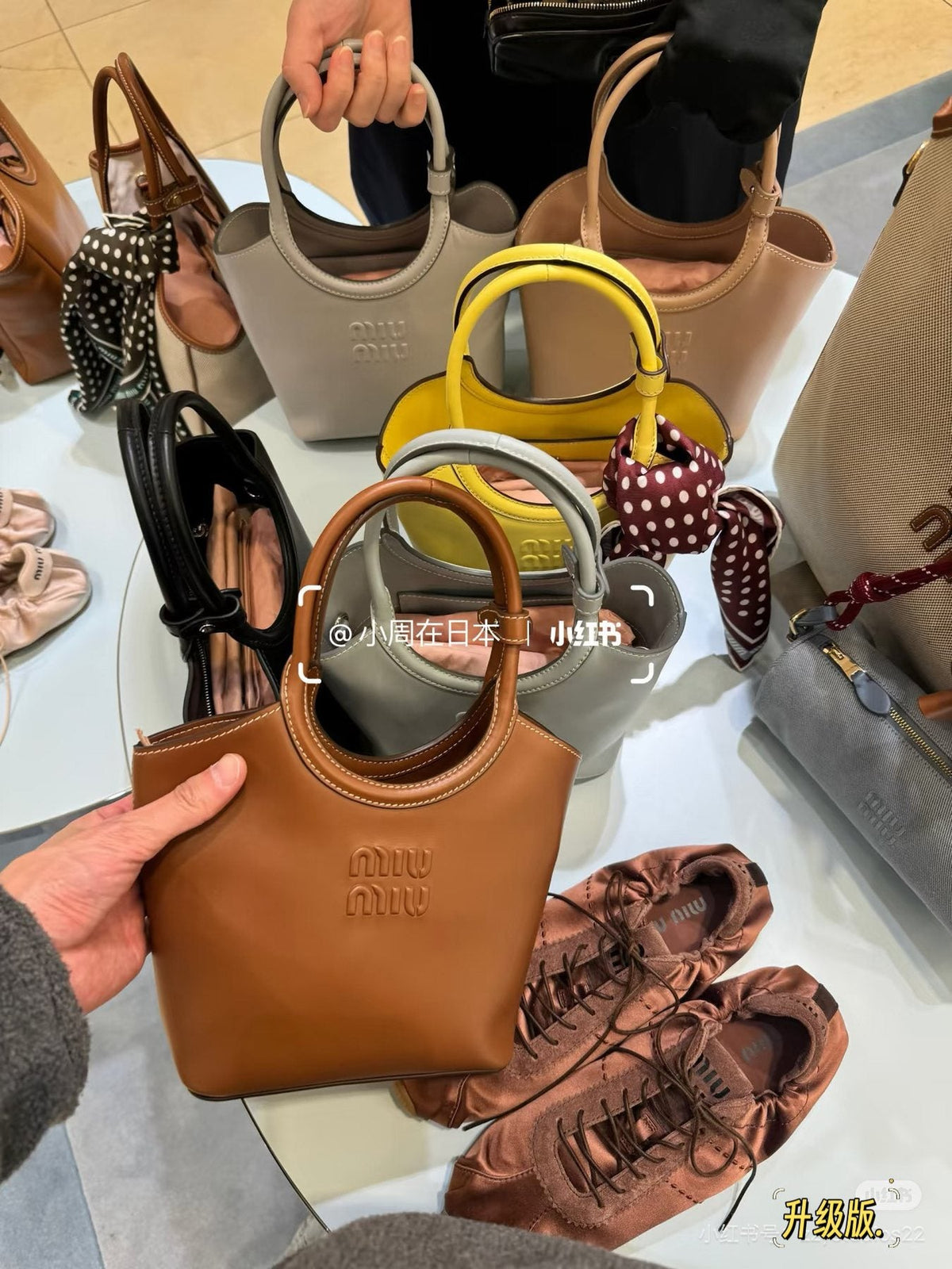Miu Miu Ivy Circular-Handle Handbag — comparison