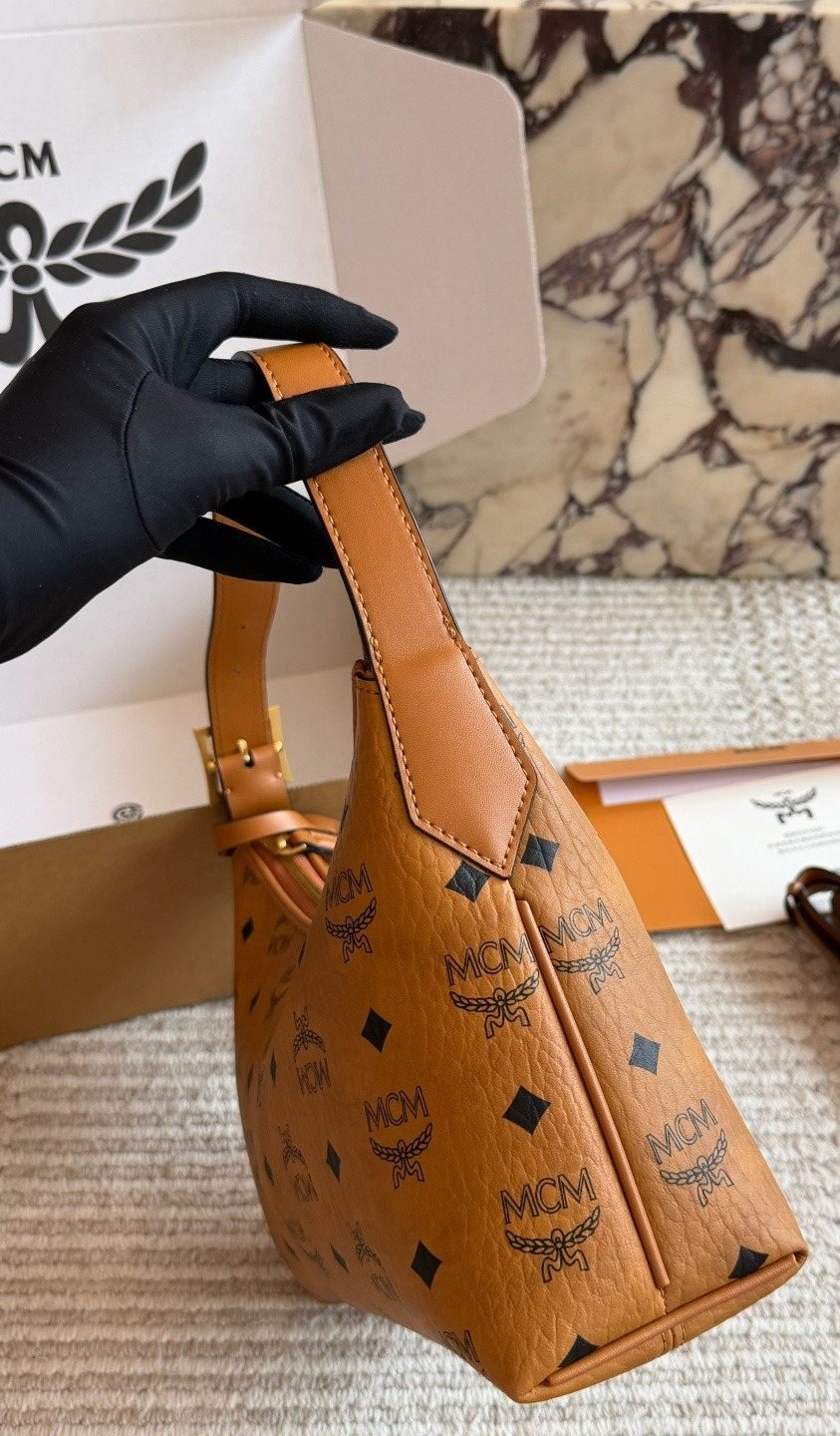 MCM Monogram Curved Hobo Shoulder Bag — side