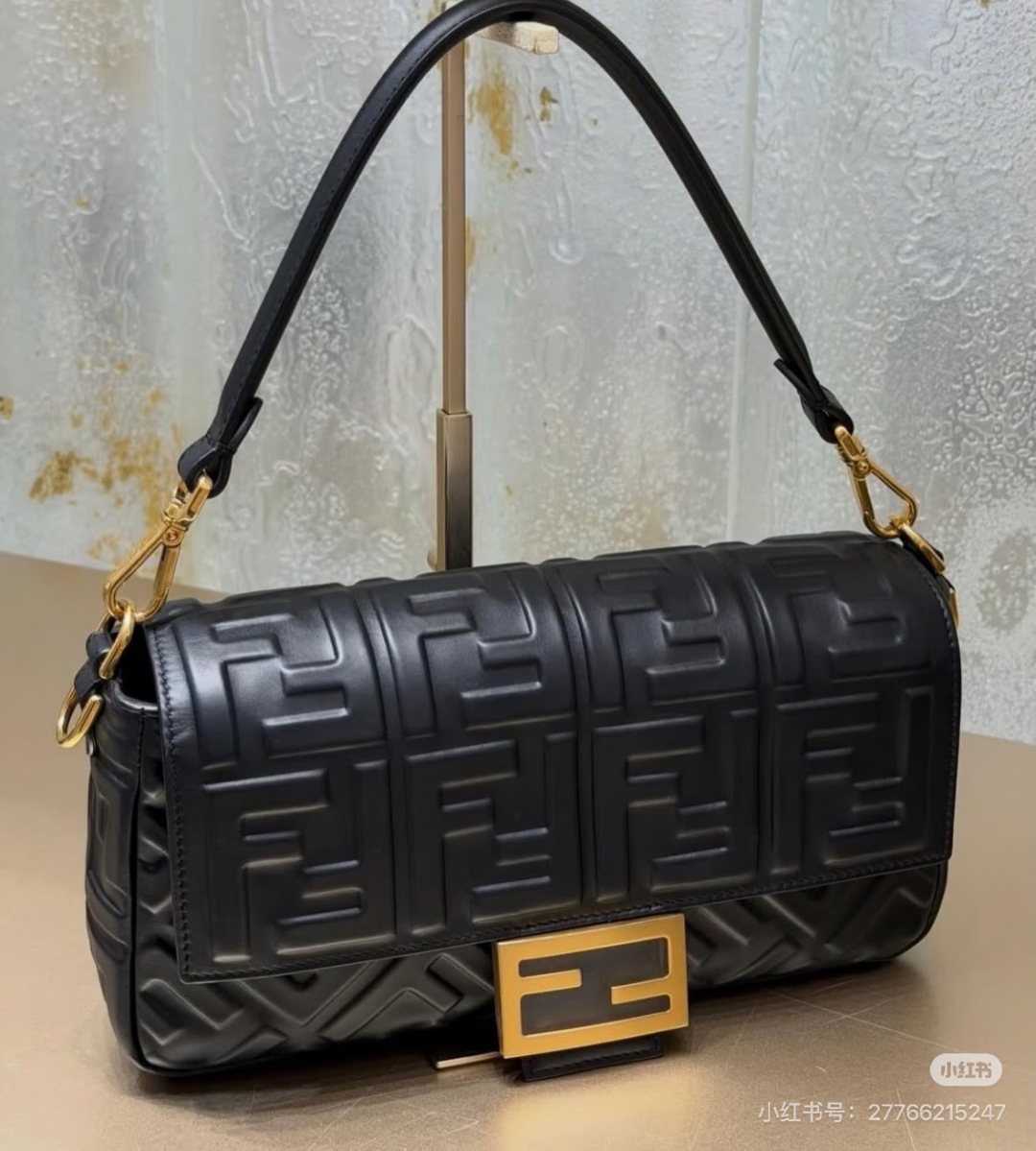 Fendi Baguette Raised FF Motif Bag — hero