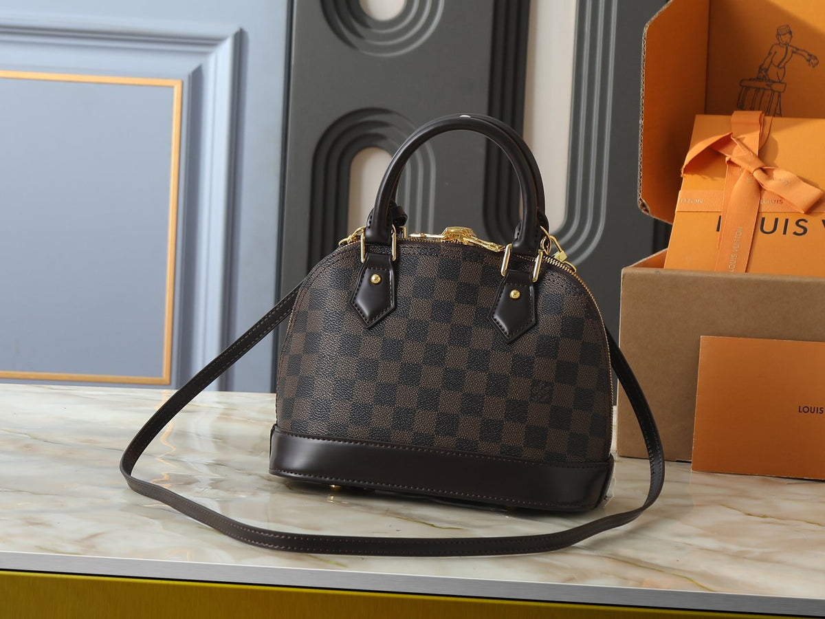 Louis Vuitton Alma Structured Top-Handle Bag — front