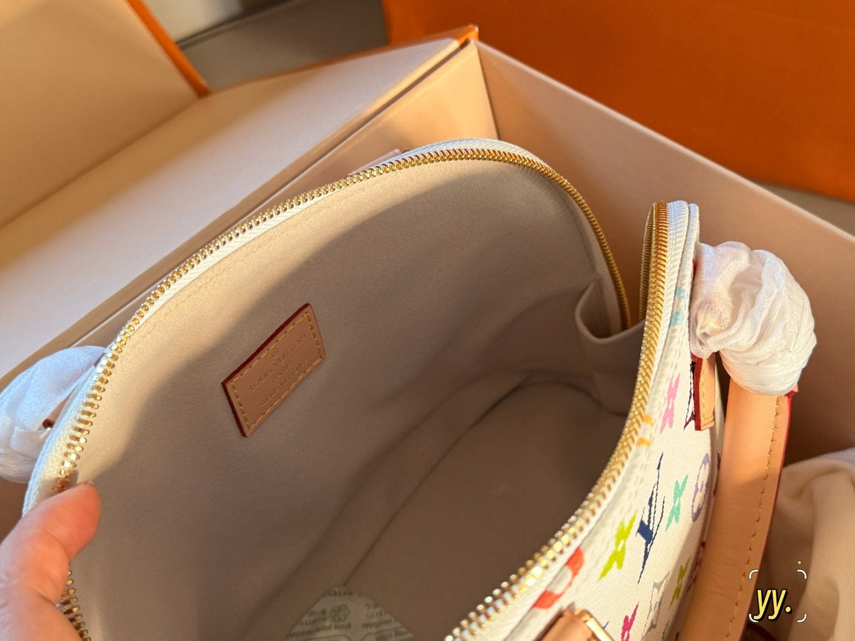 Louis Vuitton Alma BB Monogram Top-Handle Bag — front