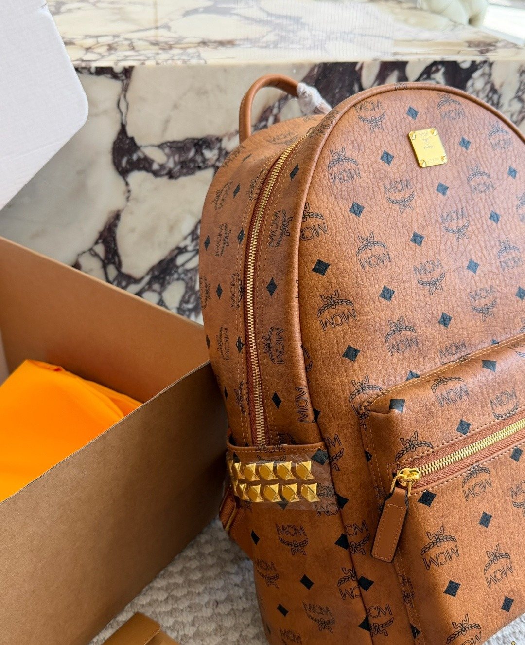 MCM Studded Monogram Backpack — side