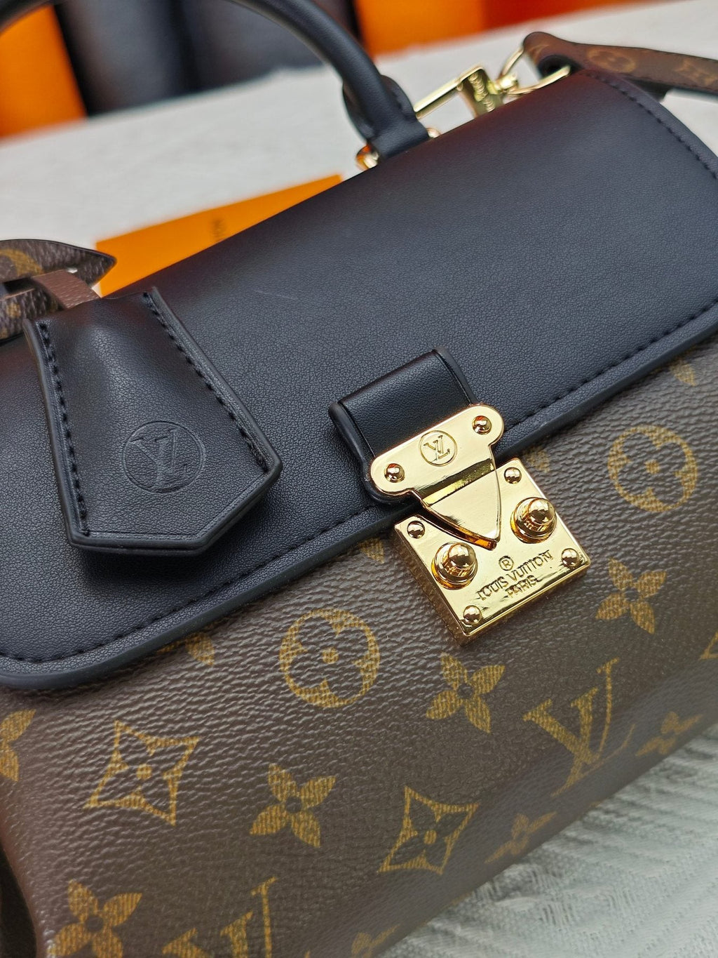 Louis Vuitton Madeleine BB Monogram Top-Handle Bag — detail