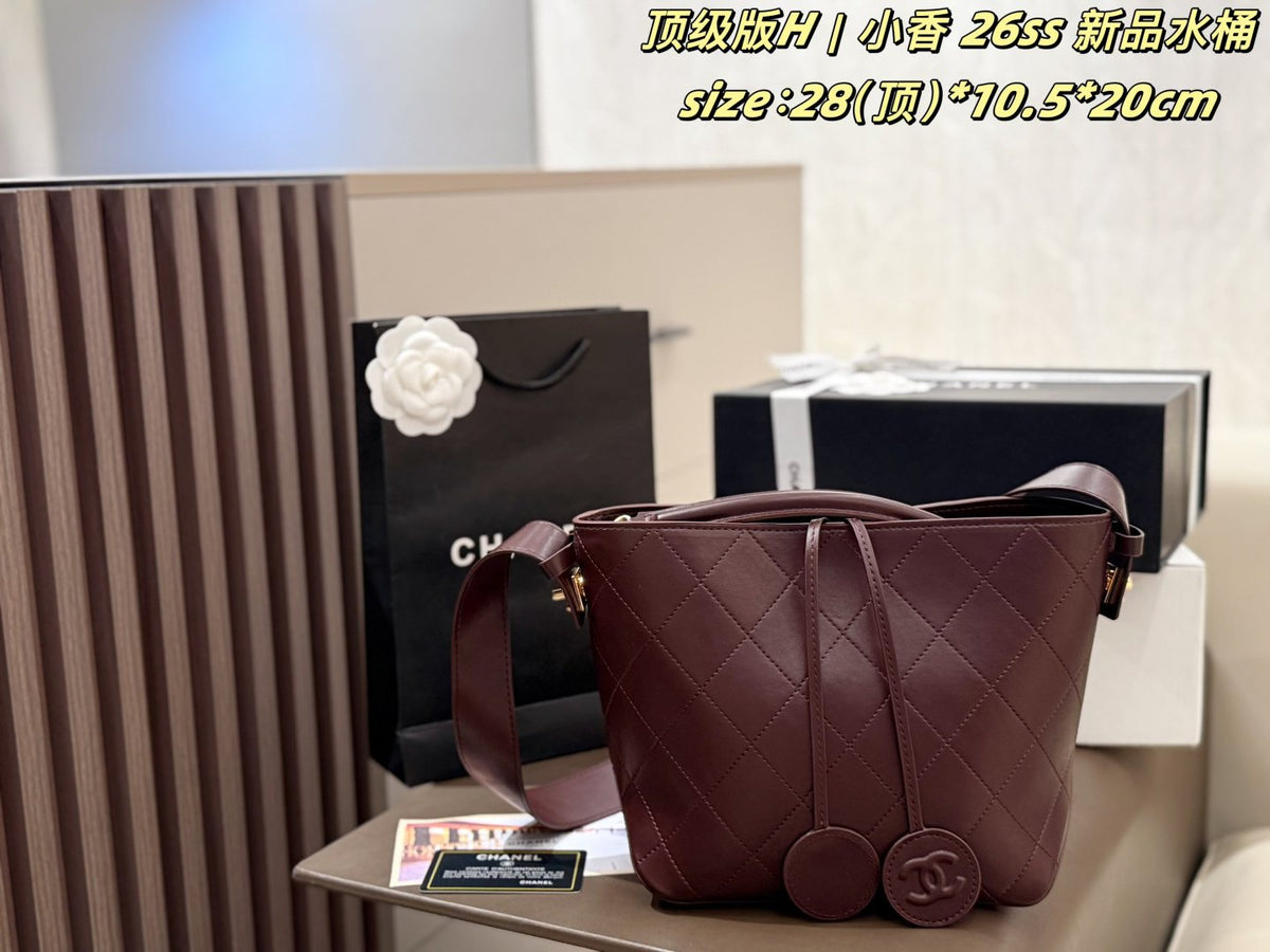 Chanel Diamond-Quilted Pendant Bucket Bag — front