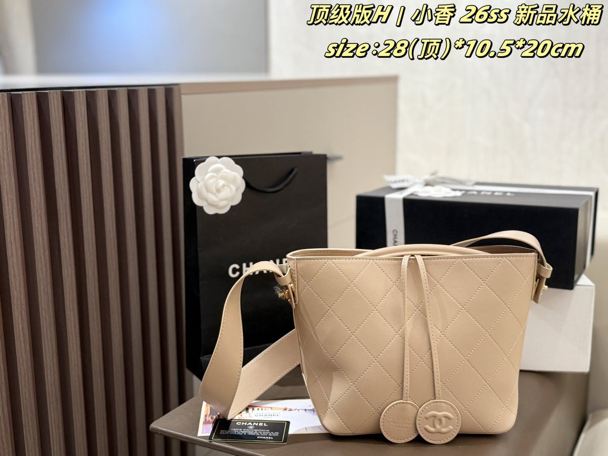 Chanel Diamond-Quilted Pendant Bucket Bag — front