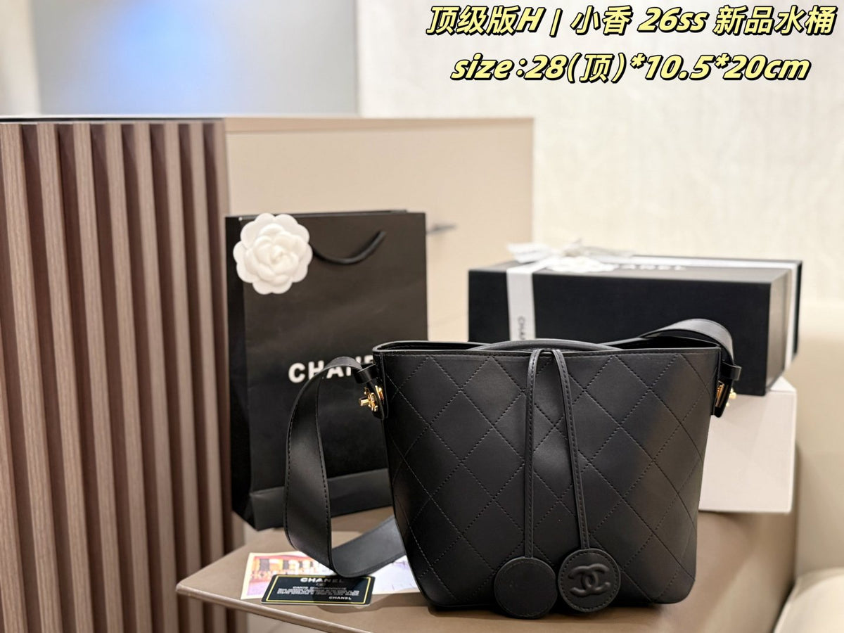 Chanel Diamond-Quilted Pendant Bucket Bag — front