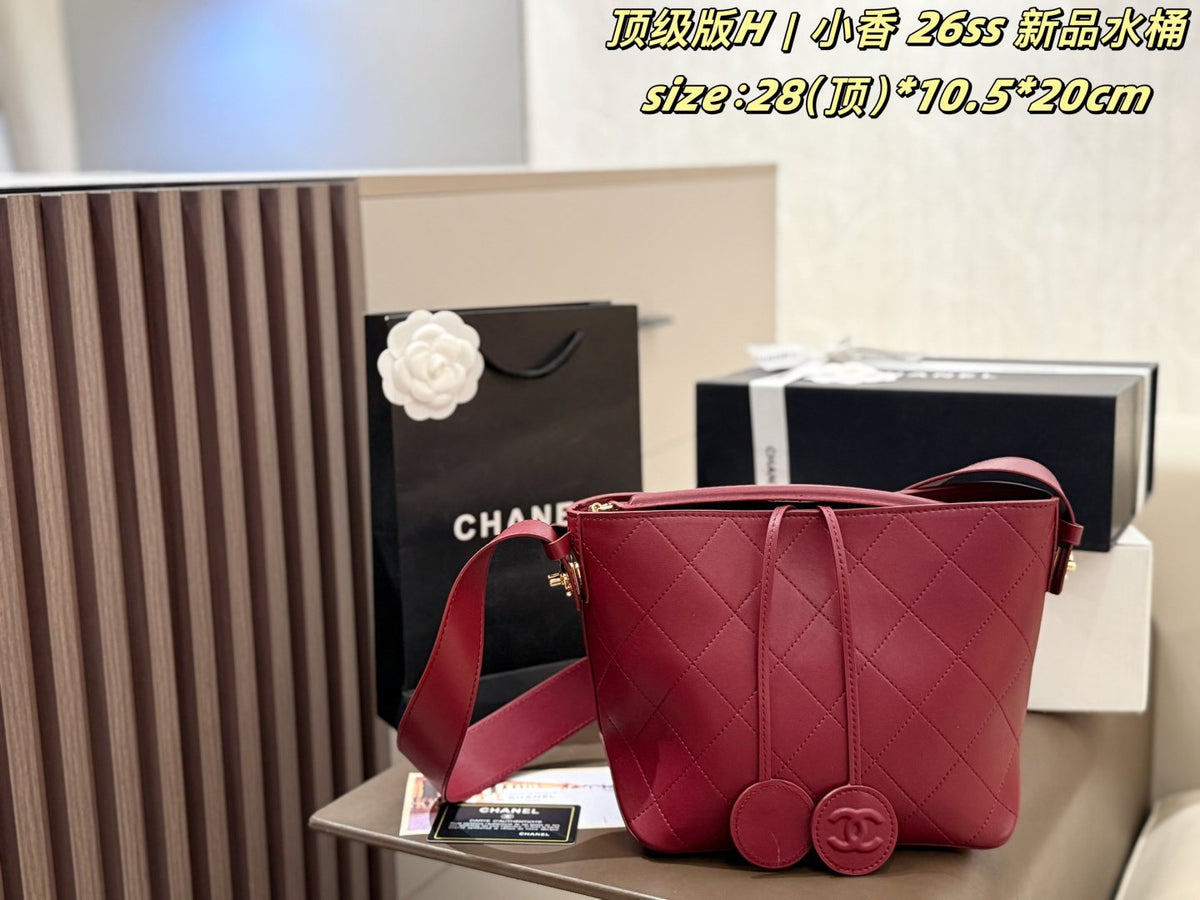 Chanel Diamond-Quilted Pendant Bucket Bag — front