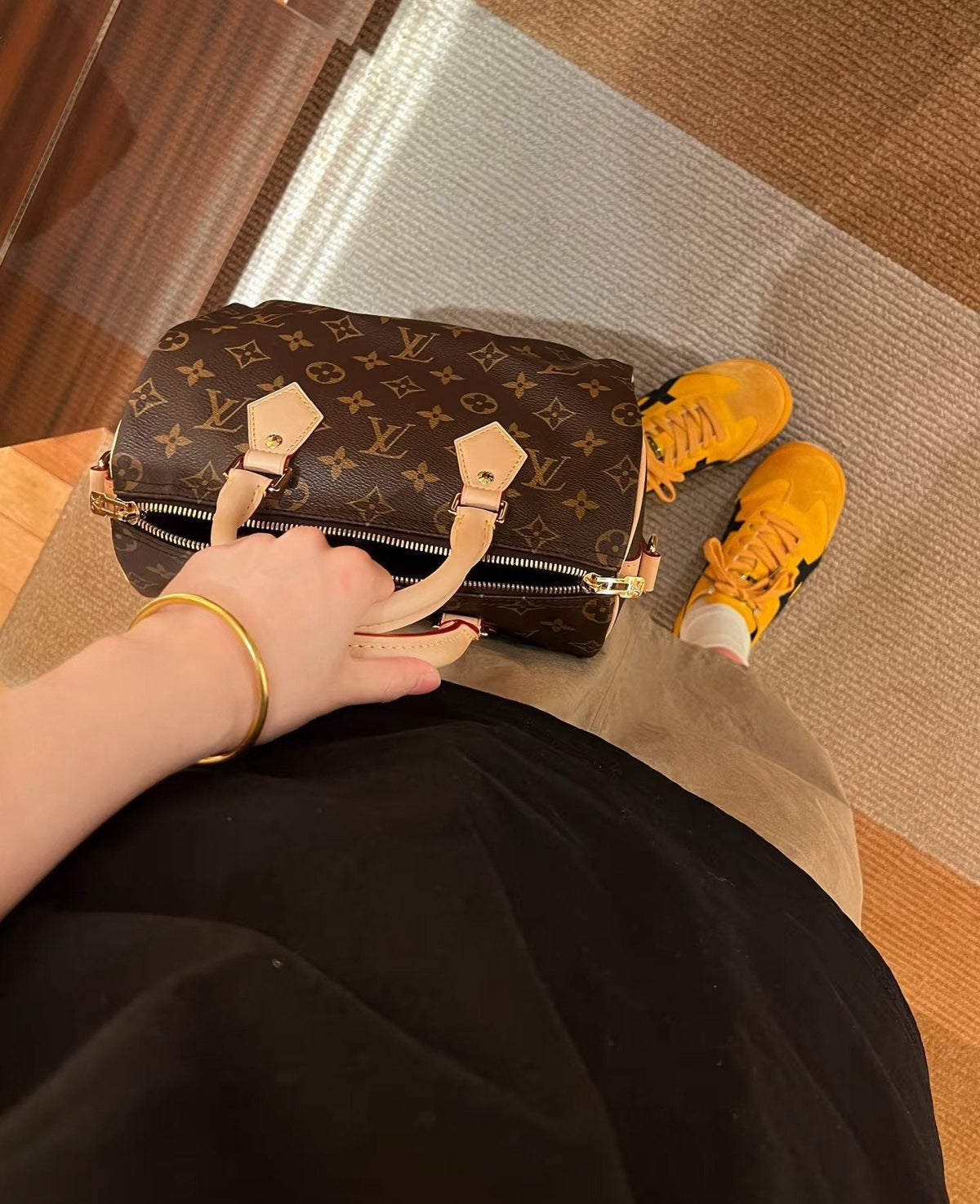 Louis Vuitton Speedy Monogram Satchel with Tan Trim — model