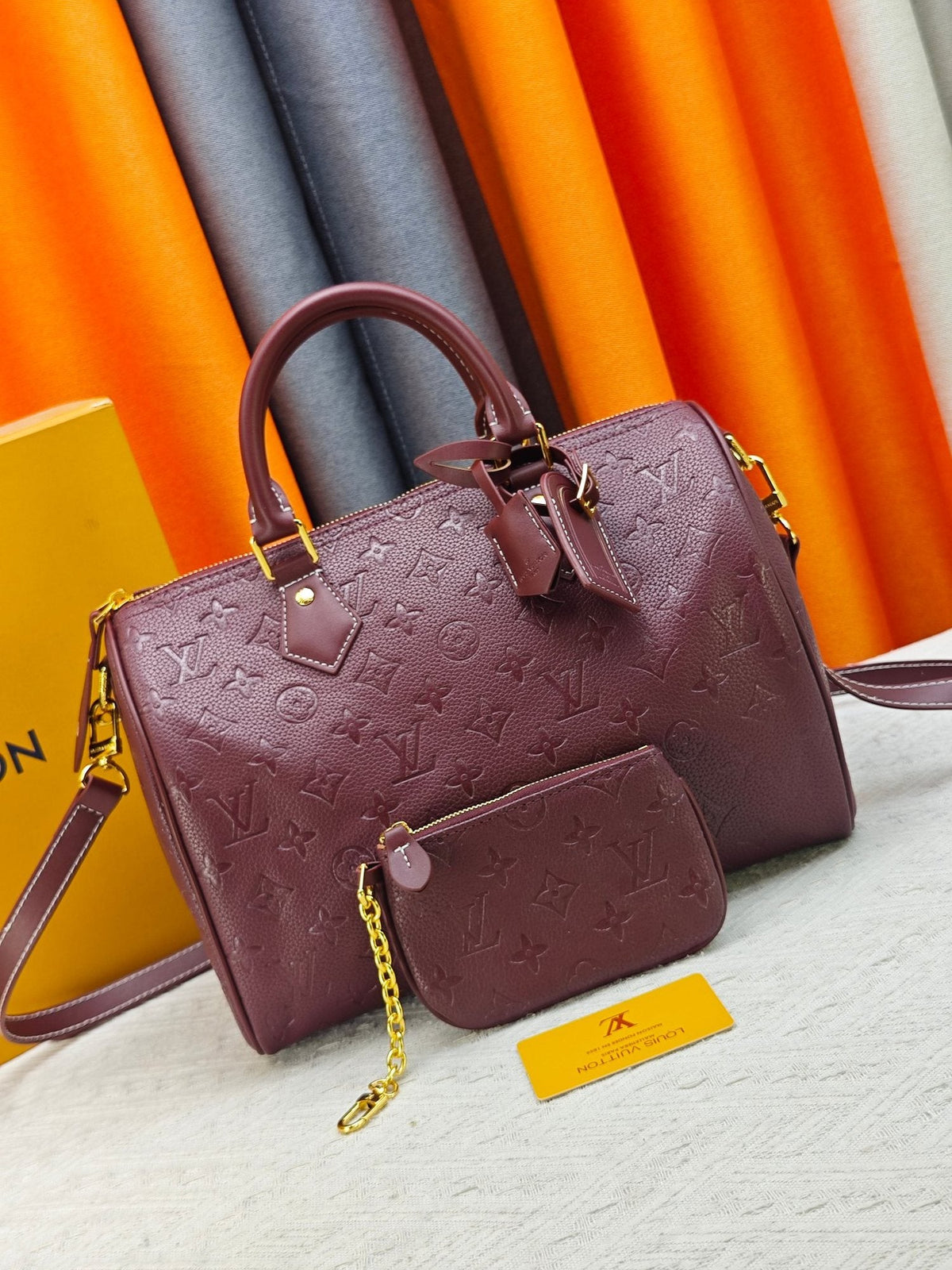 Louis Vuitton Speedy Bandoulière Burgundy Embossed Monogram Bag — hero