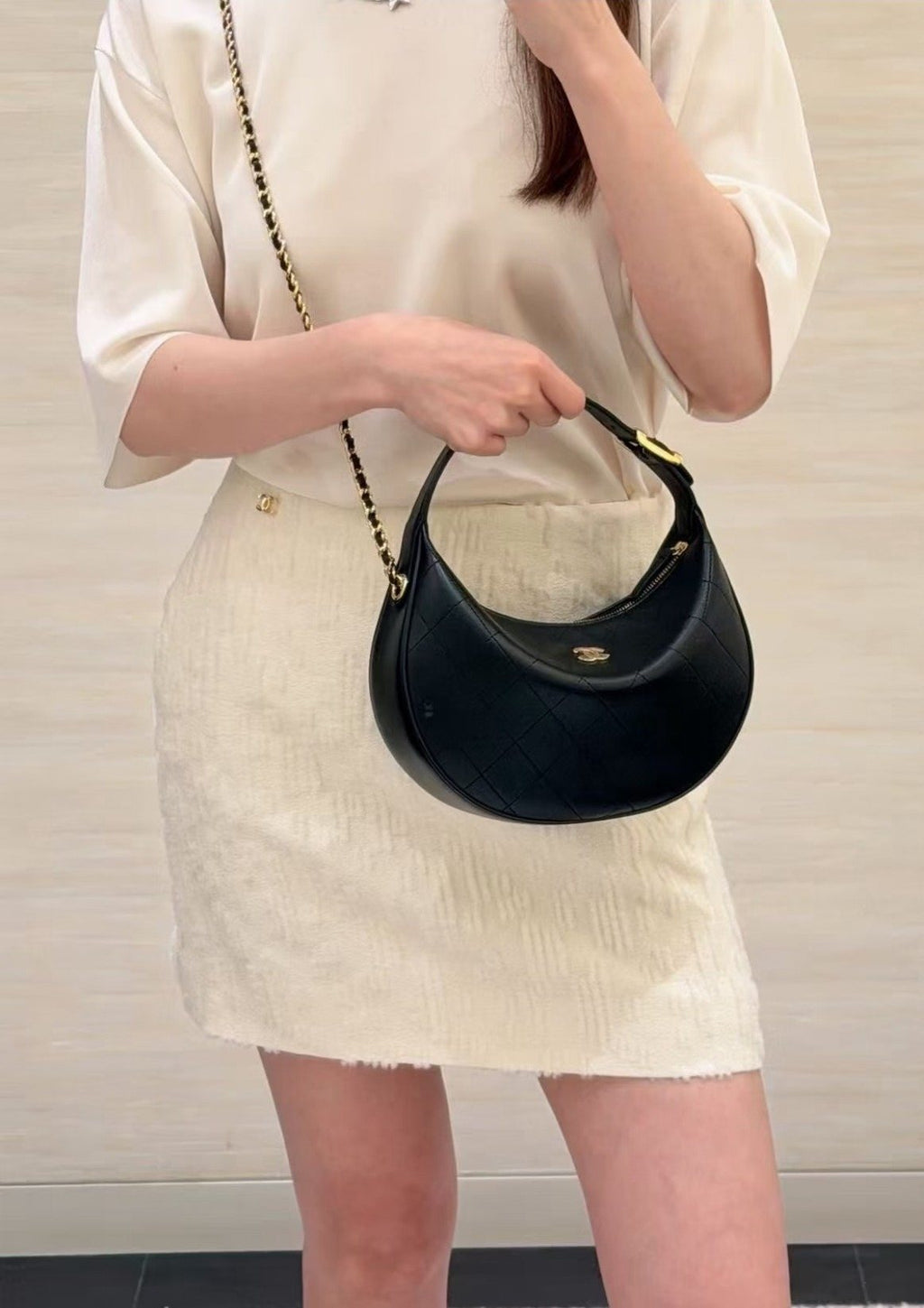 Chanel Quilted Crescent Chain Handbag — model