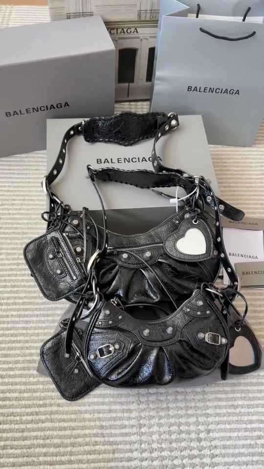 Balenciaga Le Cagole Studded Crescent Shoulder Bag — comparison
