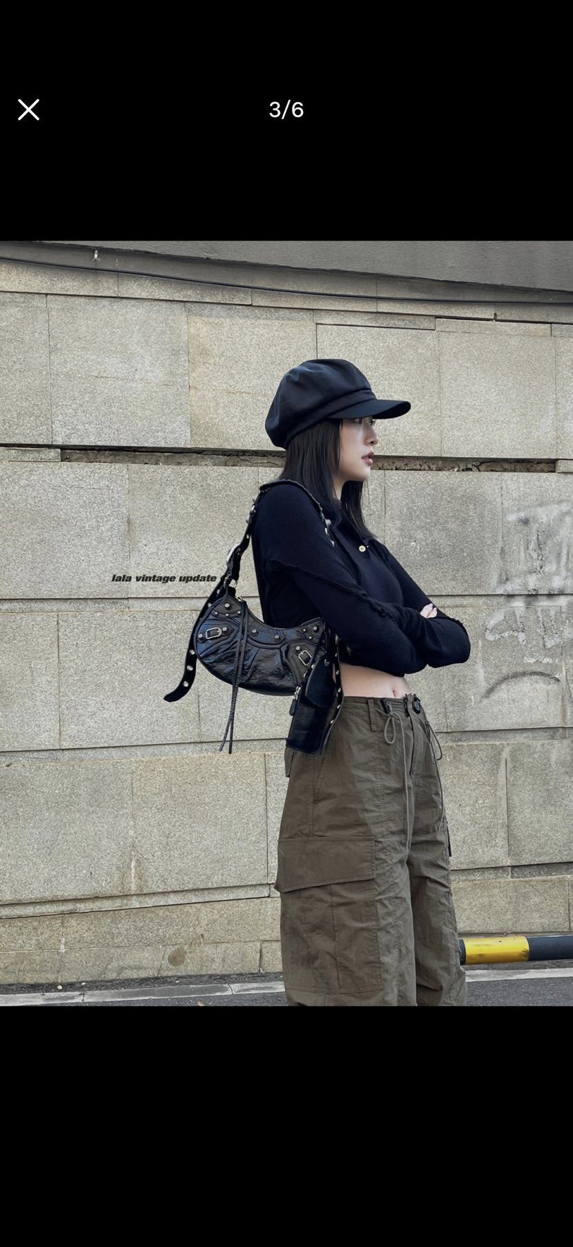 Balenciaga Le Cagole Studded Crescent Shoulder Bag — model