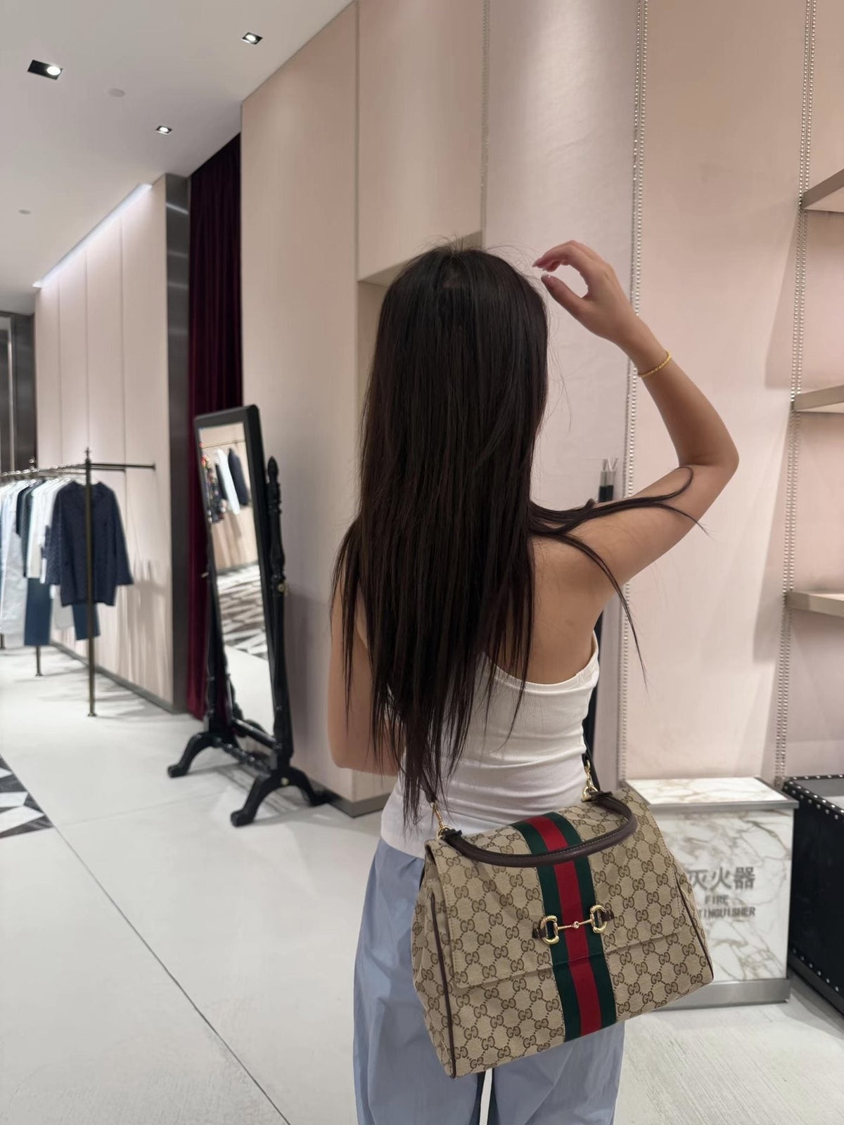 Gucci Paparazzo Monogram Horsebit Top-Handle Bag — model