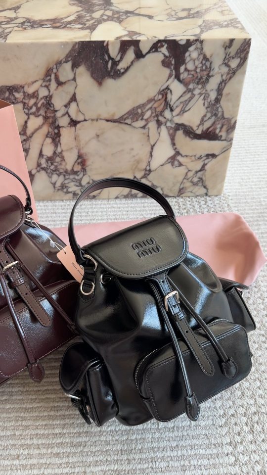 Miu Miu Buckle-Flap Pocket Backpack — hero