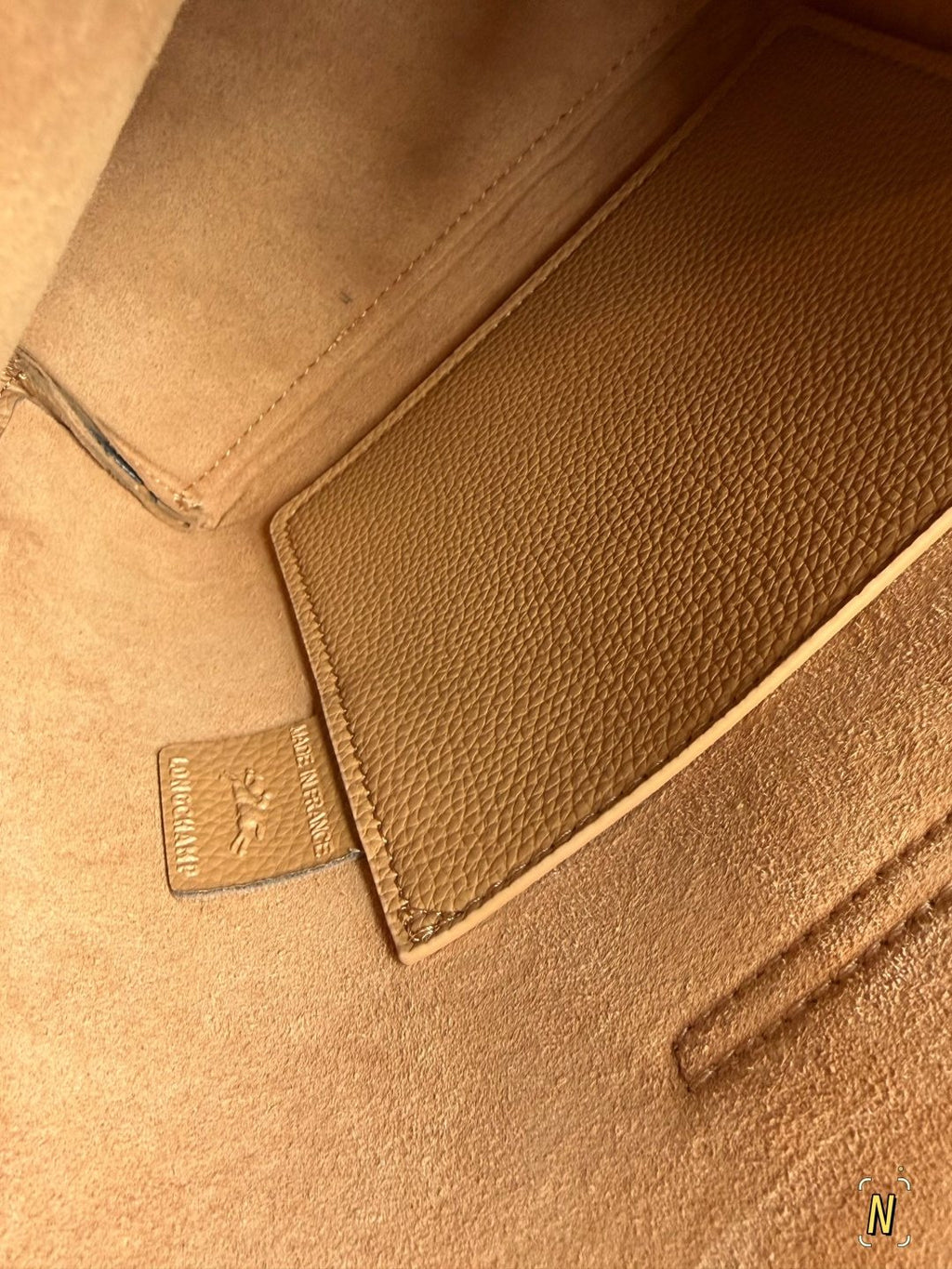 Longchamp Pebbled Bucket Bag with Rounded Snap Flap — detail