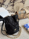 Black Quilted Chain-Strap Bucket Bag — hero