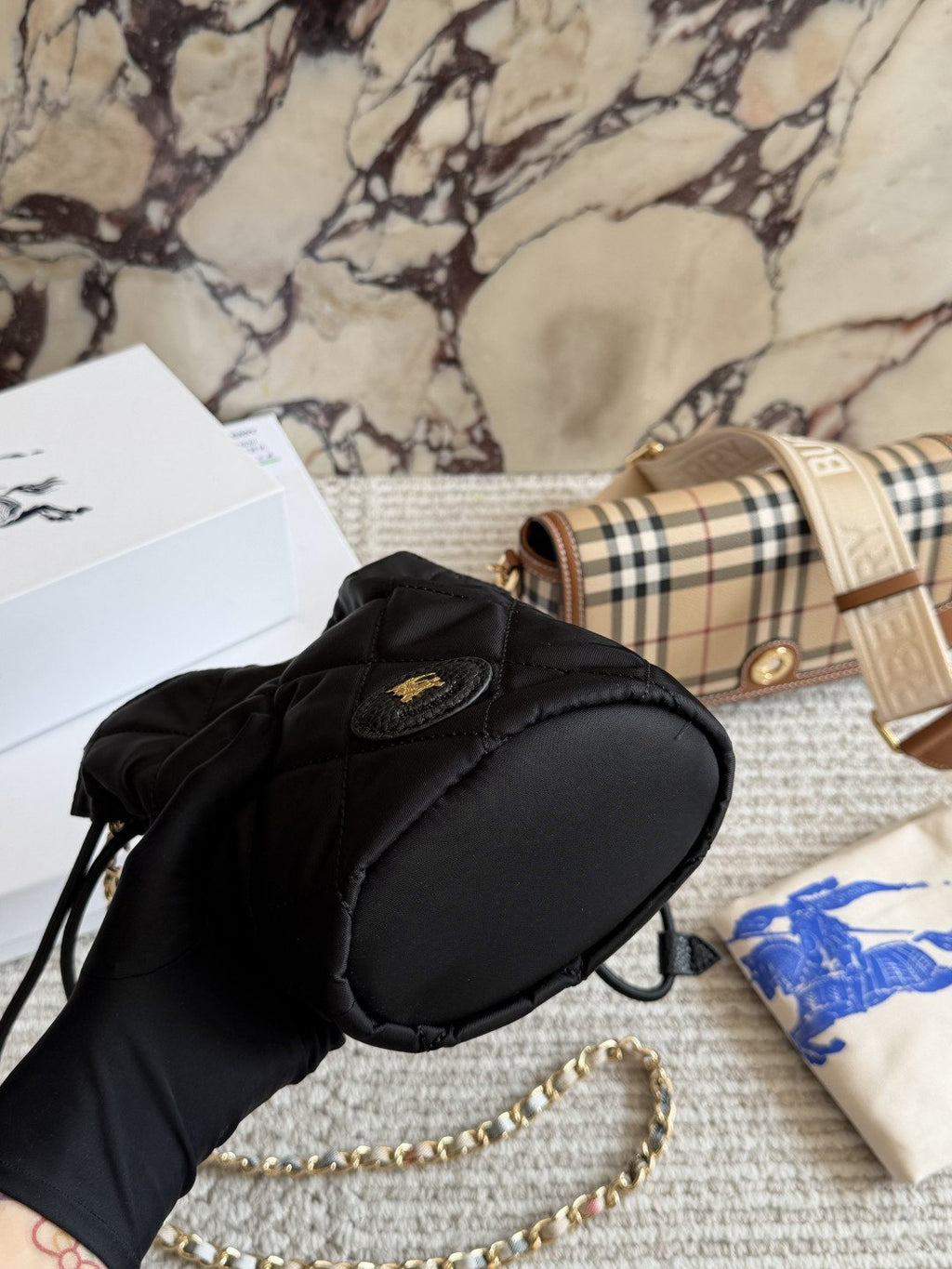Black Quilted Chain-Strap Bucket Bag — front