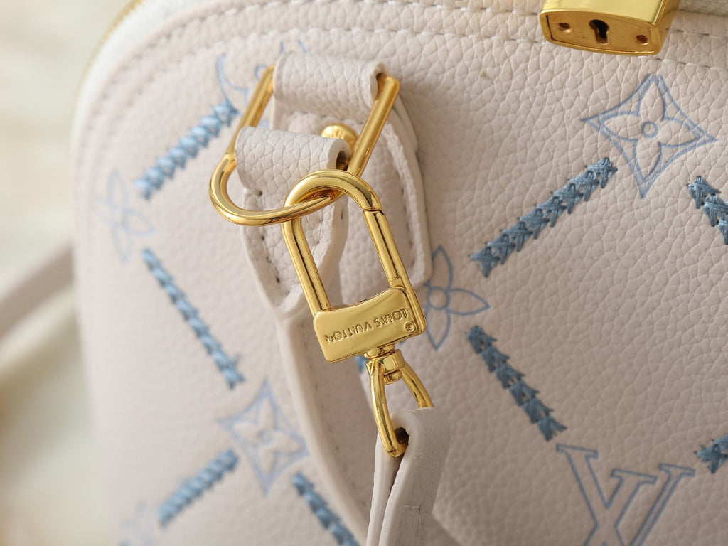 Louis Vuitton Alma BB Monogram Empreinte Couture Handbag — detail