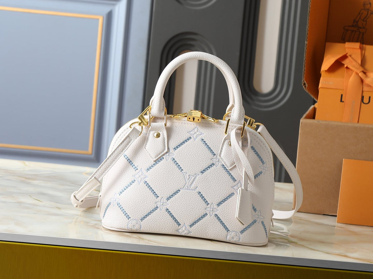 Louis Vuitton Alma BB Monogram Empreinte Couture Handbag — hero