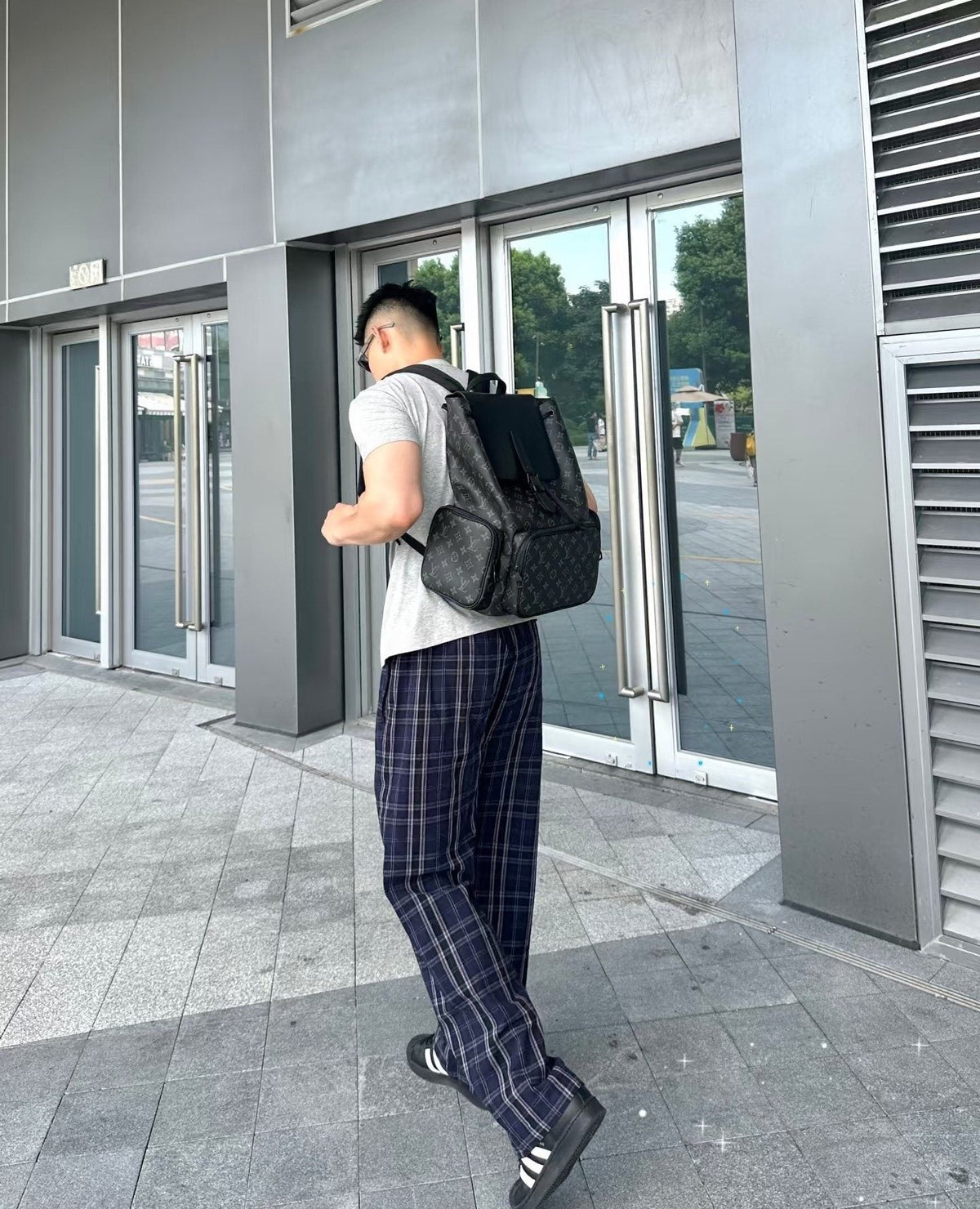 Louis Vuitton Apollo Monogram Eclipse Backpack — model