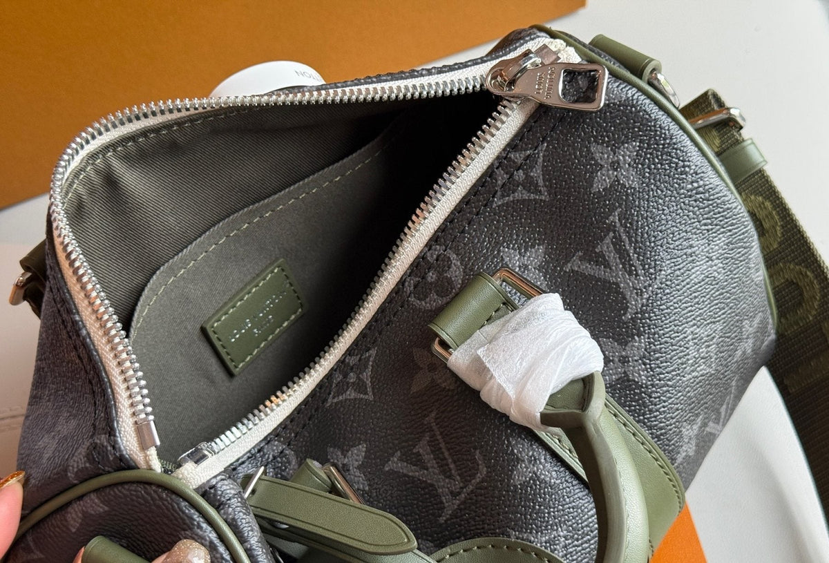 Louis Vuitton Keepall Monogram Duffel Bag with Olive Trim — detail