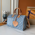 Louis Vuitton Speedy Soft Monogram Denim Handbag — hero