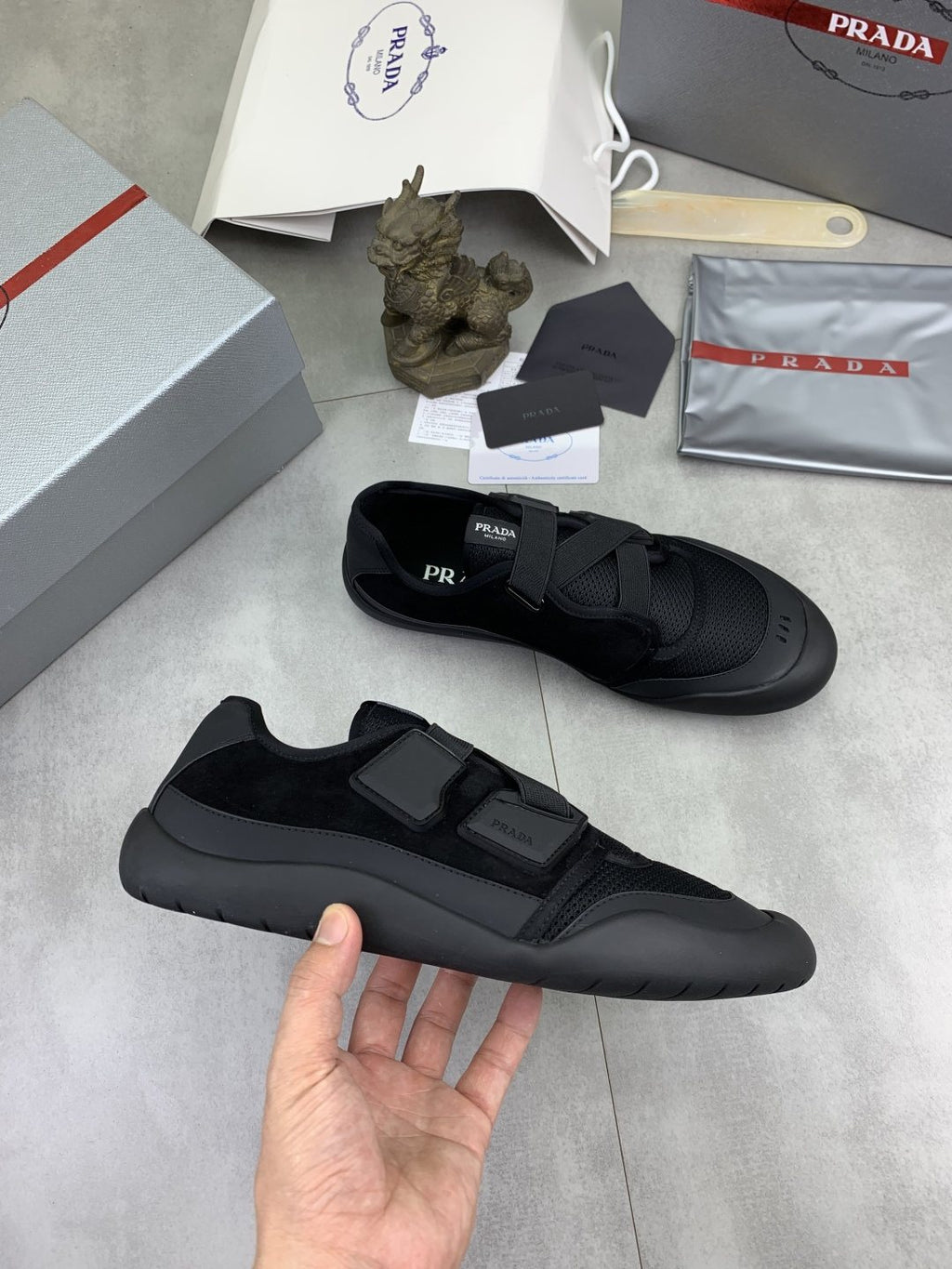 Prada Cross-Strap Low-Top Sneakers — side