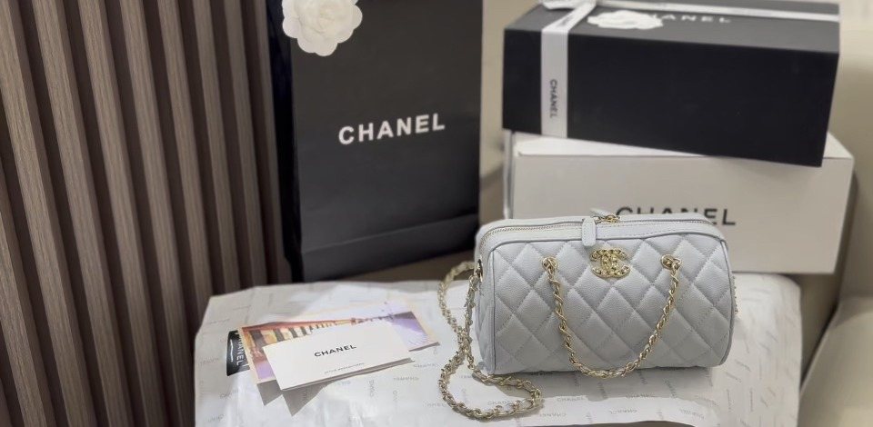 Chanel Quilted Bowling Bag with Jeweled CC Emblem — front