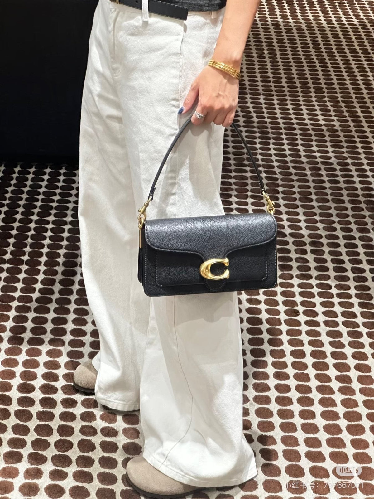 Coach Tabby Curved-Flap Shoulder Bag — model