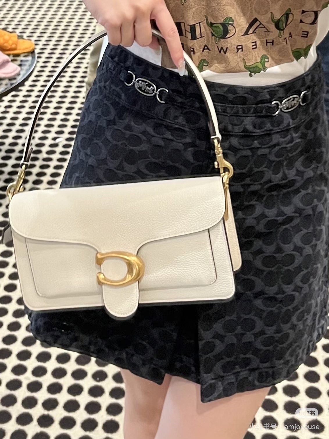 Coach Tabby Curved-Flap Shoulder Bag — model