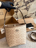 Coach Signature Pattern Bucket Bag — hero