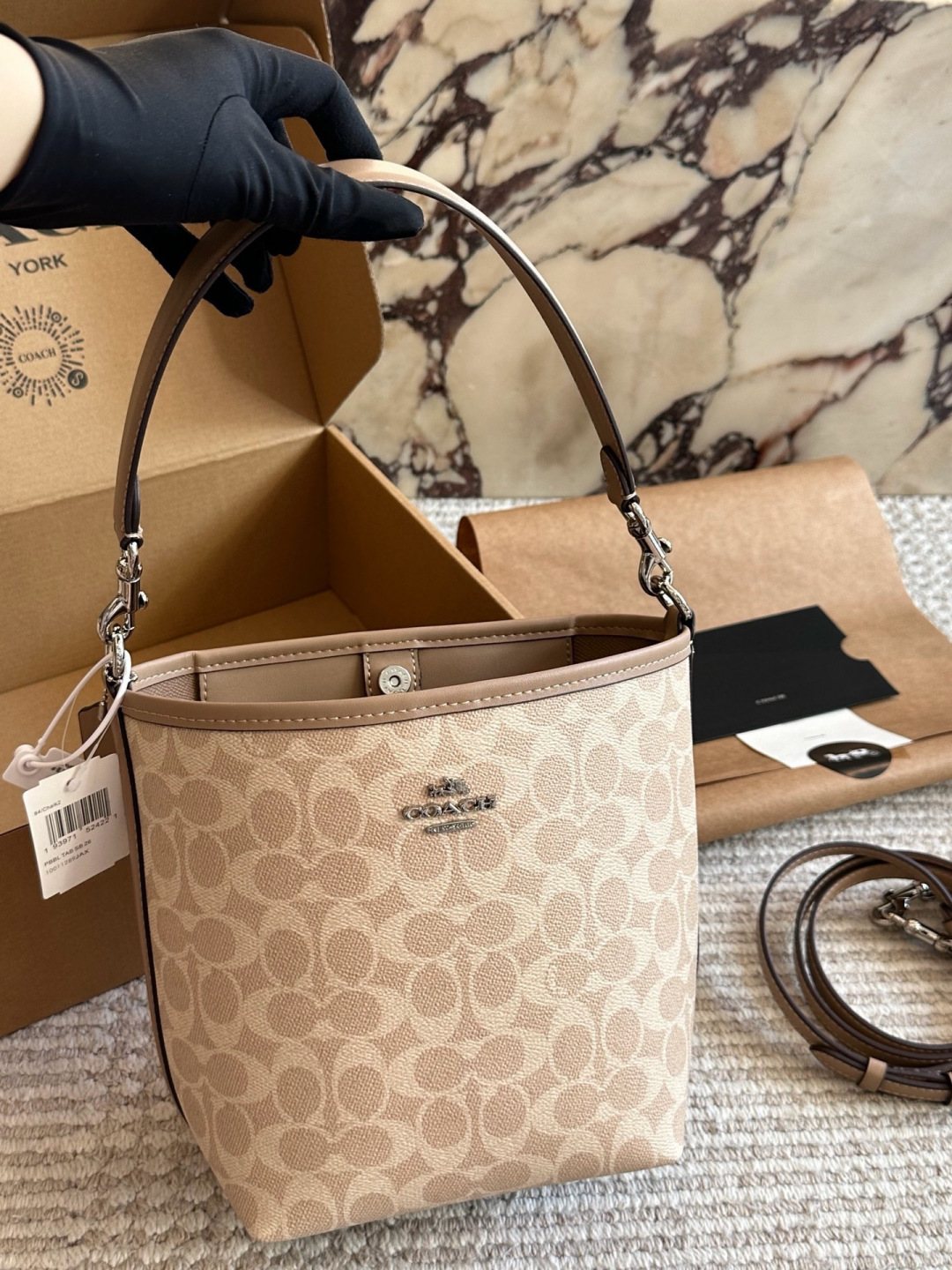 Coach Signature Pattern Bucket Bag — hero