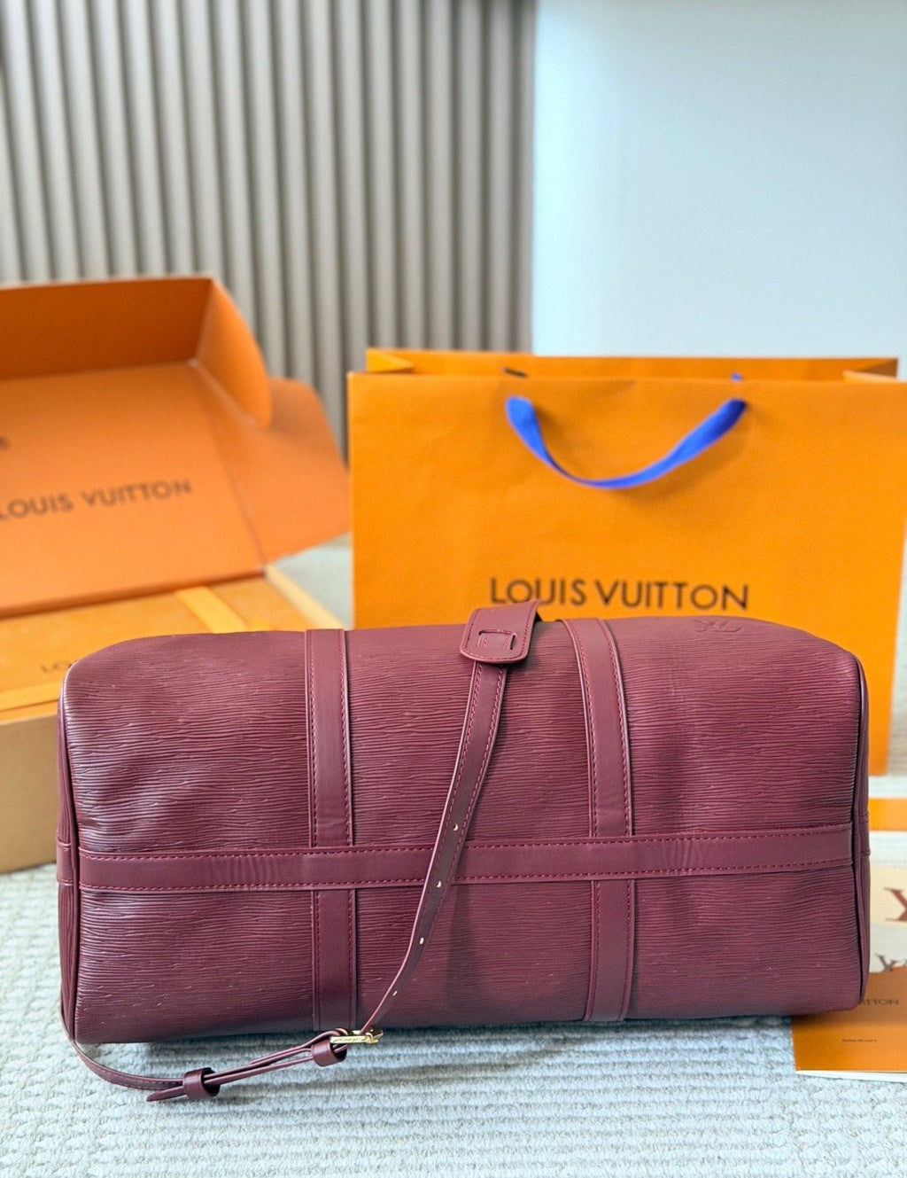 Louis Vuitton Keepall Burgundy Leather Travel Bag — detail