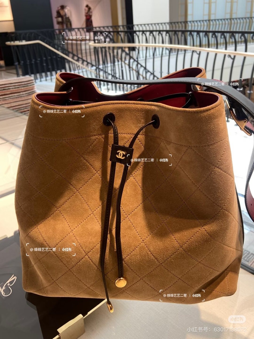 Chanel Diamond-Pattern Drawstring Bucket Bag — hero